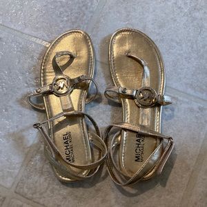 Gently worn gold Michael Kors sandals size 4